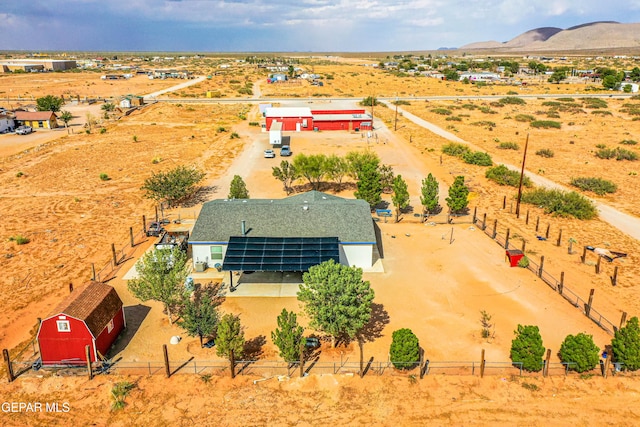 drone / aerial view featuring a rural view and a mountain view