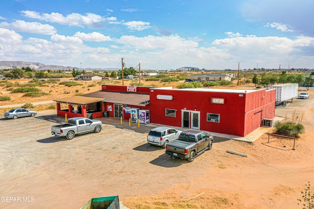 view of building exterior featuring a mountain view