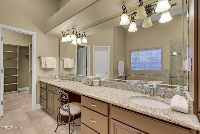 bathroom featuring vanity and walk in shower