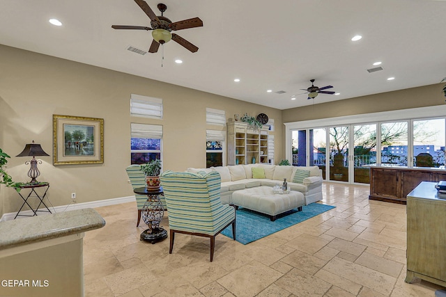 living room featuring ceiling fan