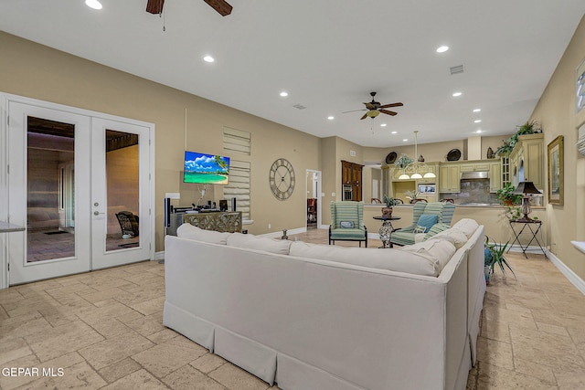 living room with french doors and ceiling fan