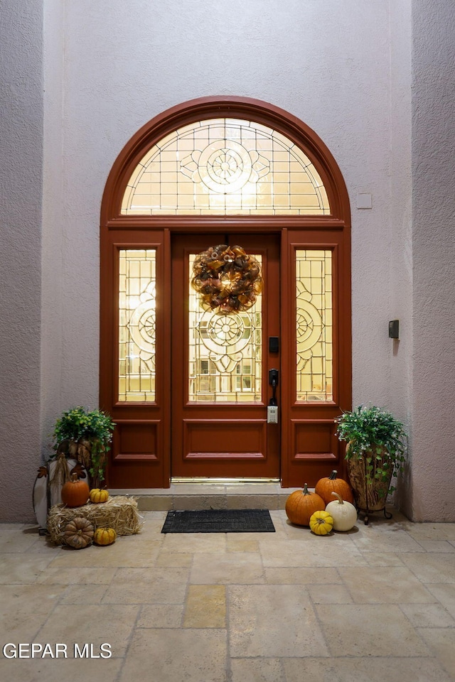 property entrance featuring french doors