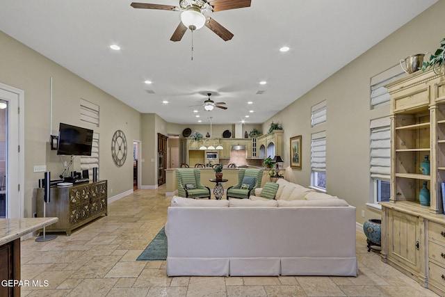 living room featuring ceiling fan