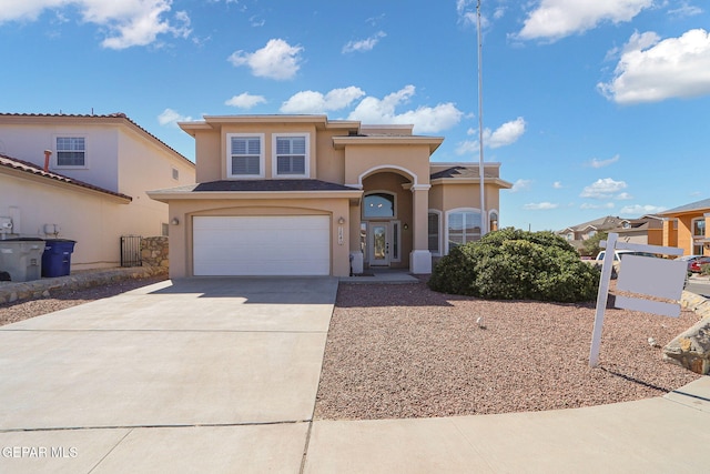 view of front of property with a garage