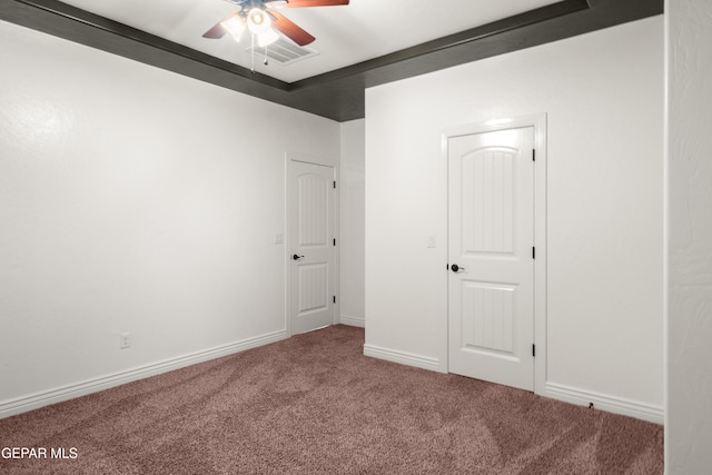 unfurnished bedroom with carpet and ceiling fan