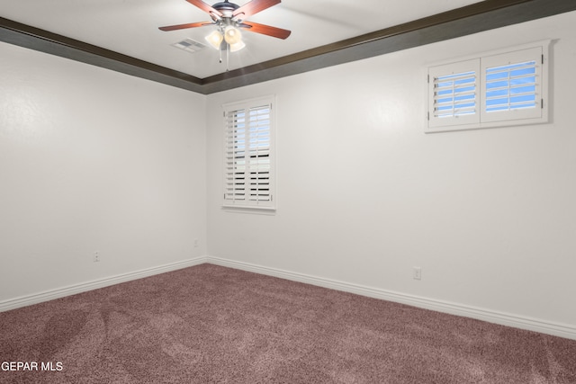 spare room with carpet floors and ceiling fan