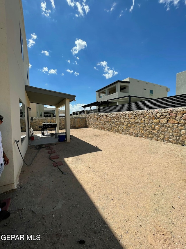 view of yard with a patio area