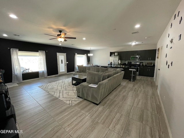 living room featuring ceiling fan