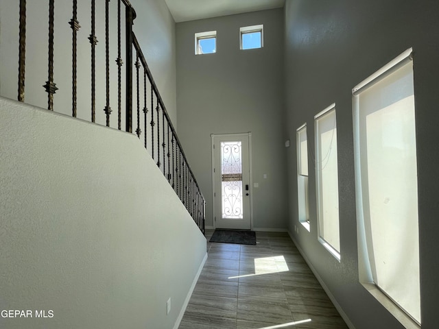 entryway with a high ceiling