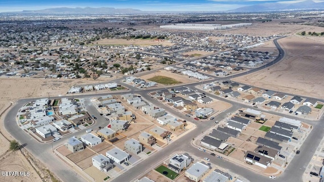 drone / aerial view featuring a mountain view