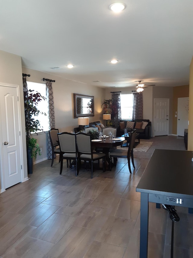 dining space featuring ceiling fan