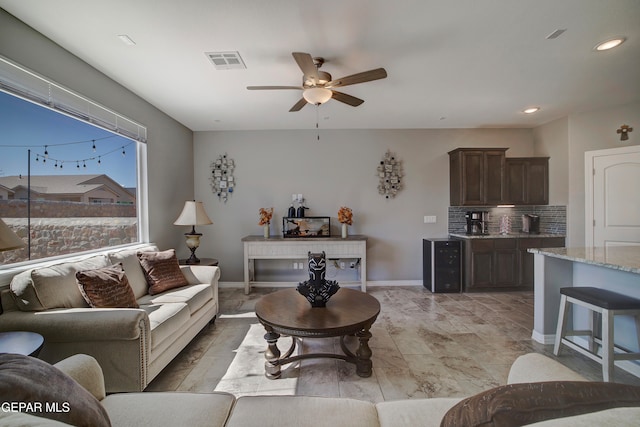 living room with ceiling fan