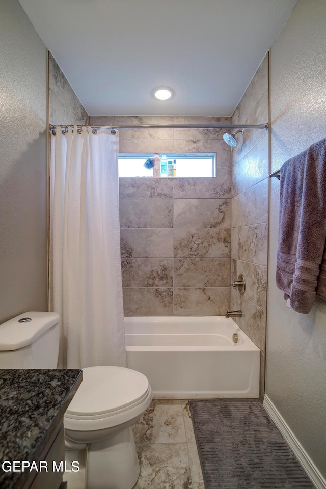 full bathroom with vanity, toilet, and shower / bath combo