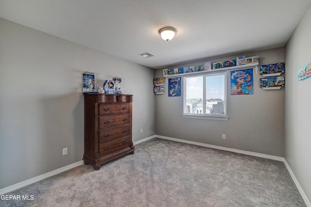 bedroom featuring light colored carpet