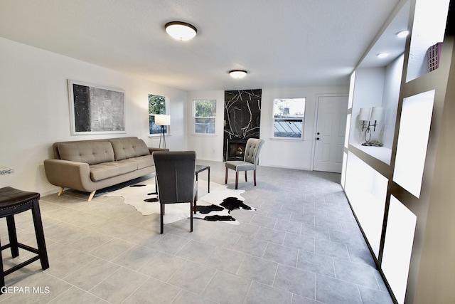 living room with light tile patterned floors