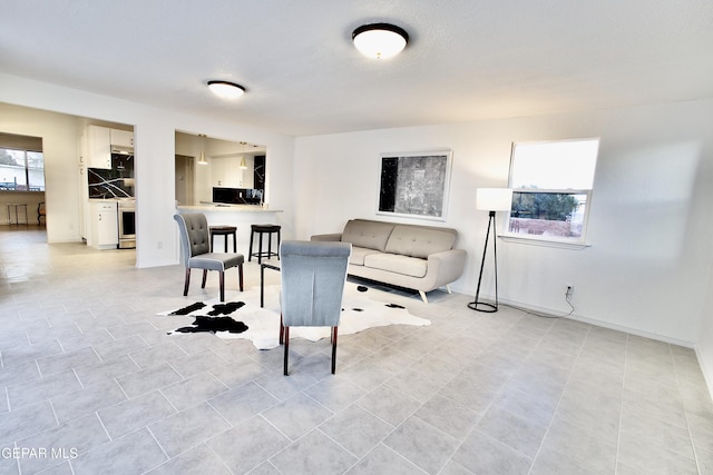 living room featuring light tile patterned flooring