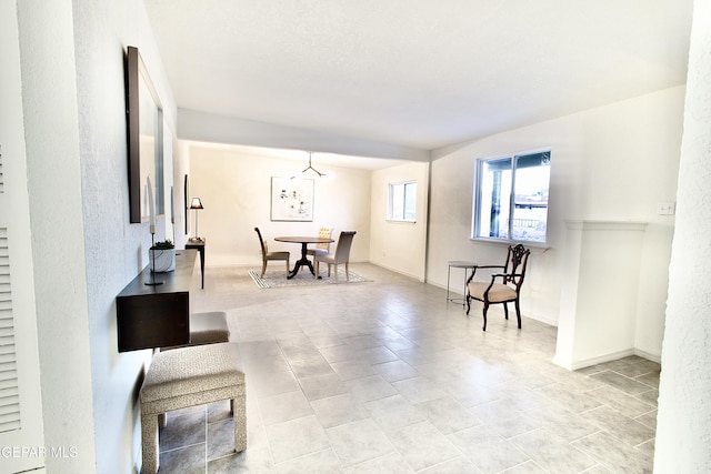 living room with light tile patterned flooring