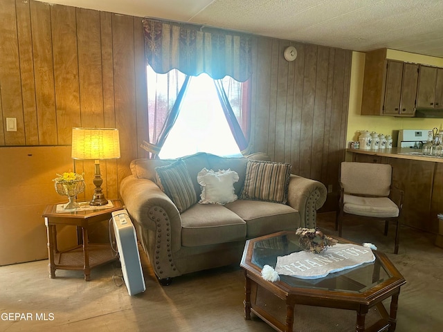 living room featuring wood walls