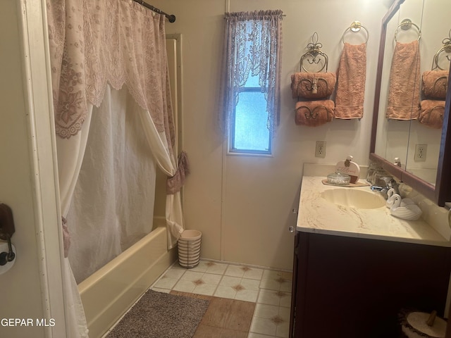 bathroom with vanity and shower / bath combo with shower curtain