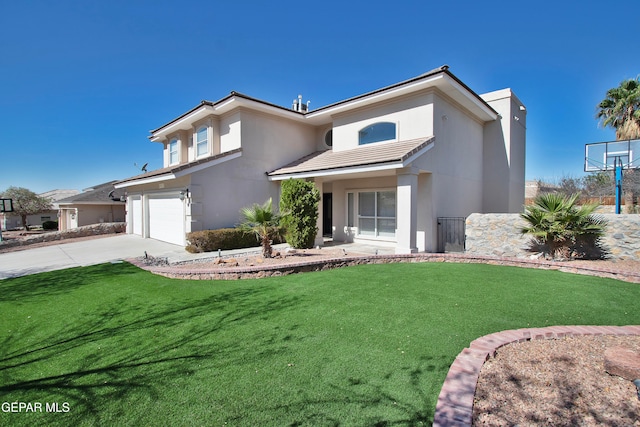 view of front facade with a front yard and a garage