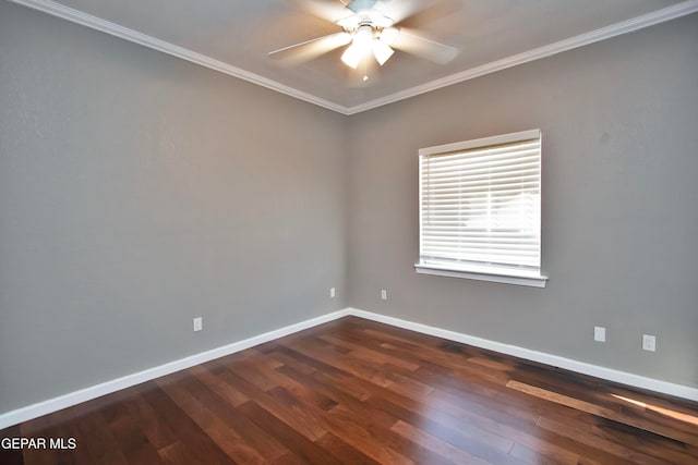 spare room with dark wood-type flooring, ceiling fan, and ornamental molding