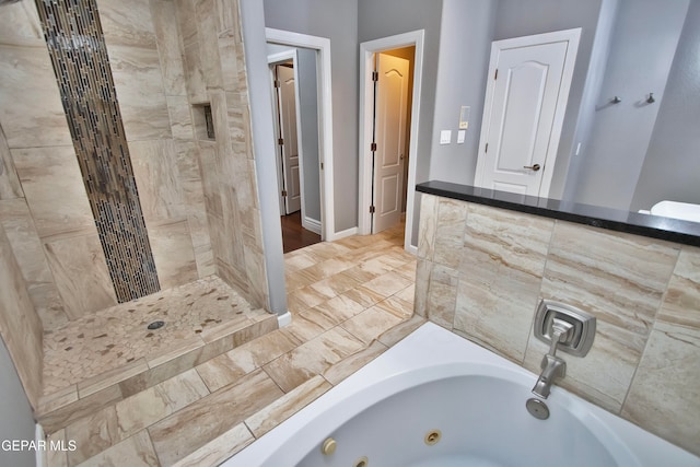 bathroom featuring plus walk in shower