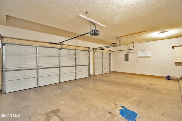 garage featuring a garage door opener and electric panel