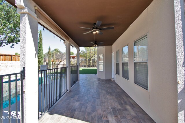 view of patio / terrace featuring ceiling fan