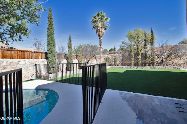 exterior space featuring a fenced in pool