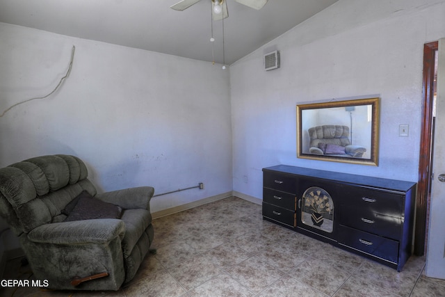 sitting room featuring lofted ceiling and ceiling fan