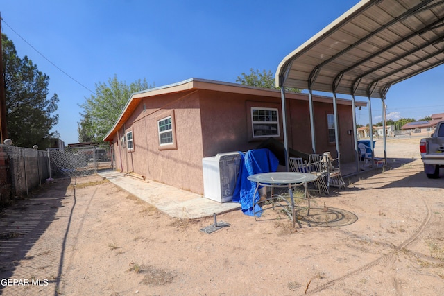 view of home's exterior featuring a patio area