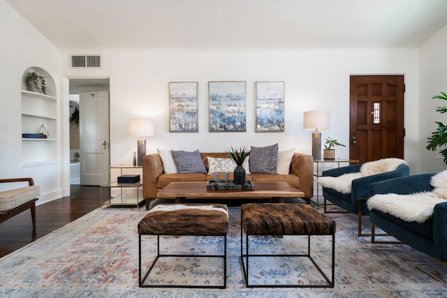 living room featuring dark hardwood / wood-style floors