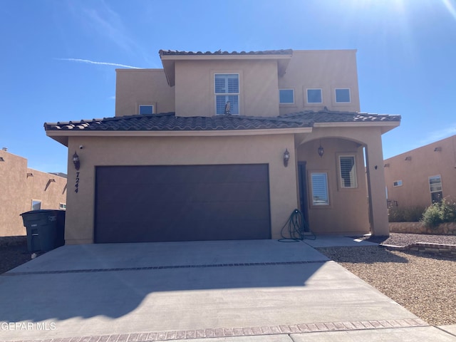 view of front of home with a garage