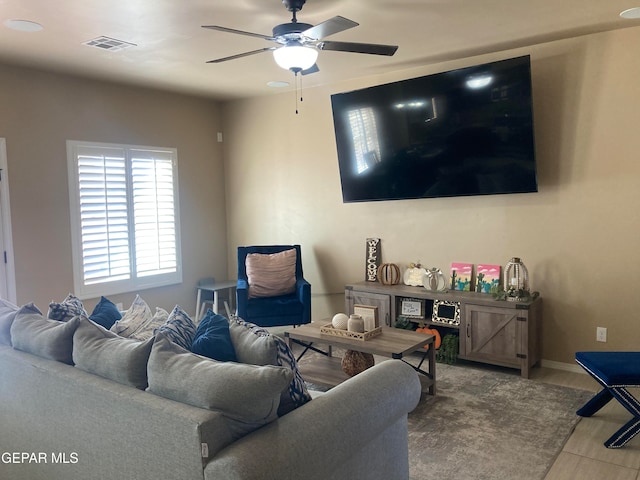 living room with ceiling fan