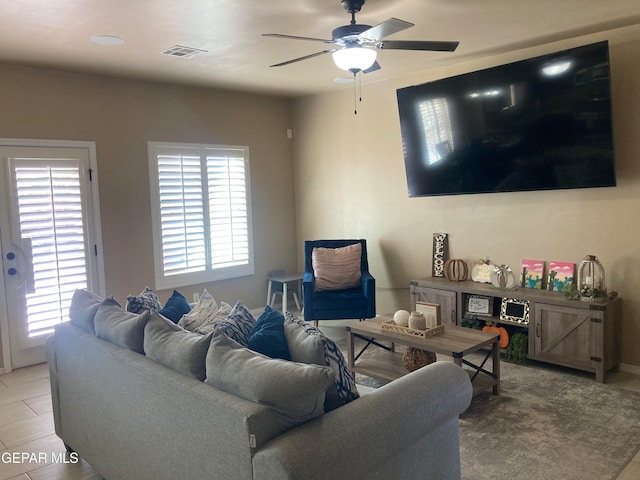 living room featuring ceiling fan