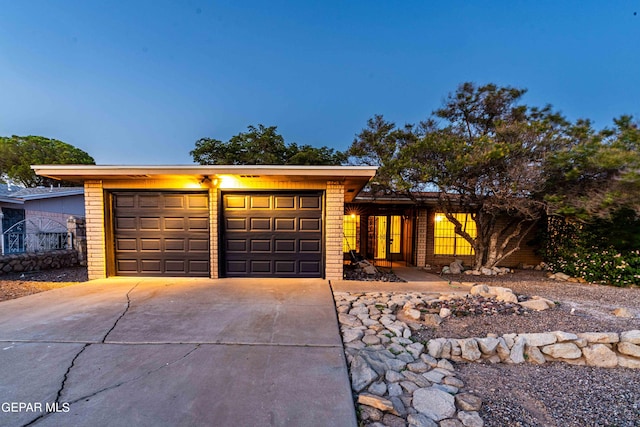 ranch-style home with a garage