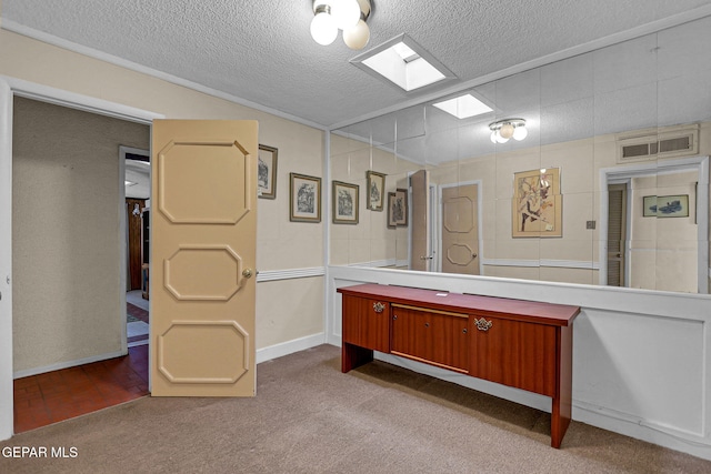 bathroom with a textured ceiling