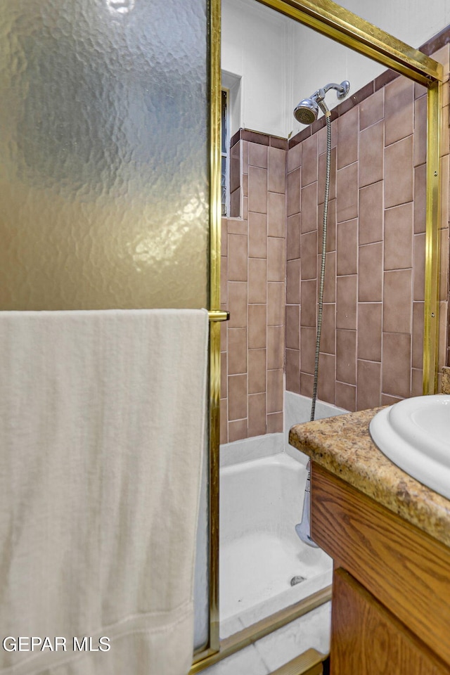 bathroom featuring vanity and separate shower and tub