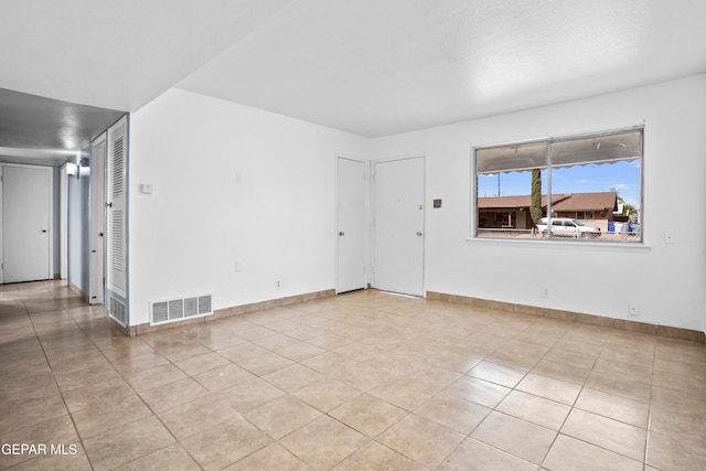 view of tiled spare room