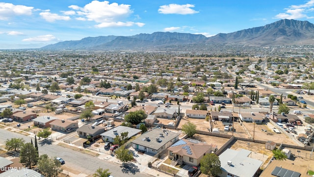 drone / aerial view featuring a mountain view