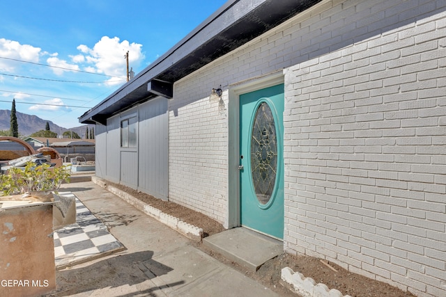 property entrance with a mountain view