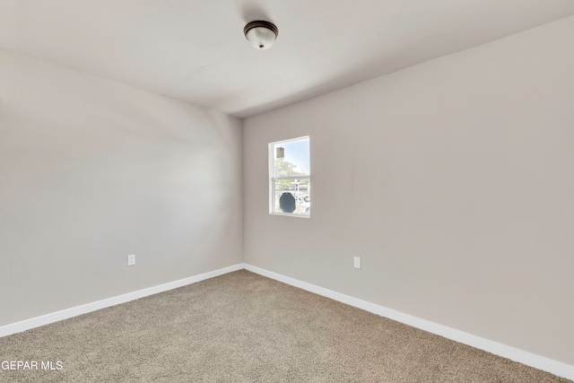 view of carpeted spare room