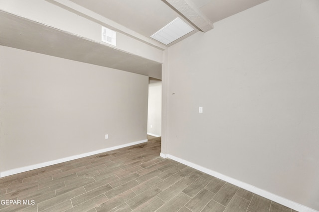 unfurnished room with light hardwood / wood-style floors