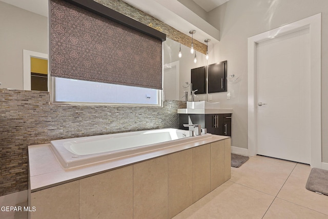 bathroom with vanity, tile patterned floors, beamed ceiling, and a washtub