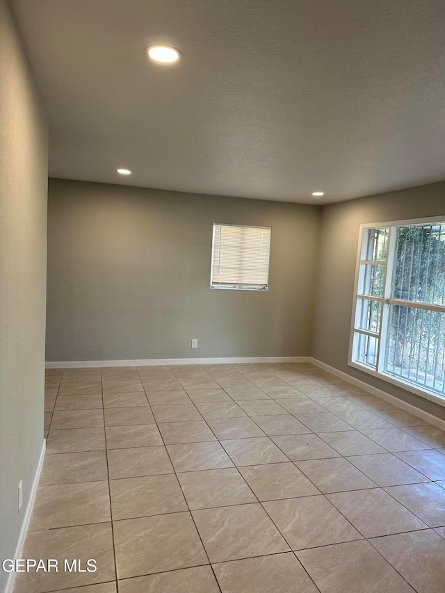 view of tiled spare room