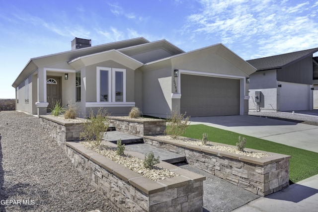 15248 Gauge Ct, El Paso, TX 79938 - single story home with an attached garage, stucco siding, driveway, and a chimney
