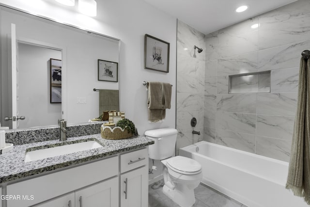 15248 Gauge Ct, El Paso, TX 79938 - bathroom featuring washtub / shower combination, vanity, toilet, marble finish floor, and baseboards
