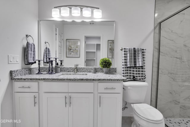15248 Gauge Ct, El Paso, TX 79938 - bathroom with vanity, a shower stall, and toilet