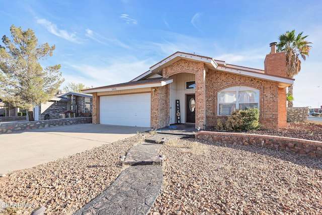 single story home featuring a garage