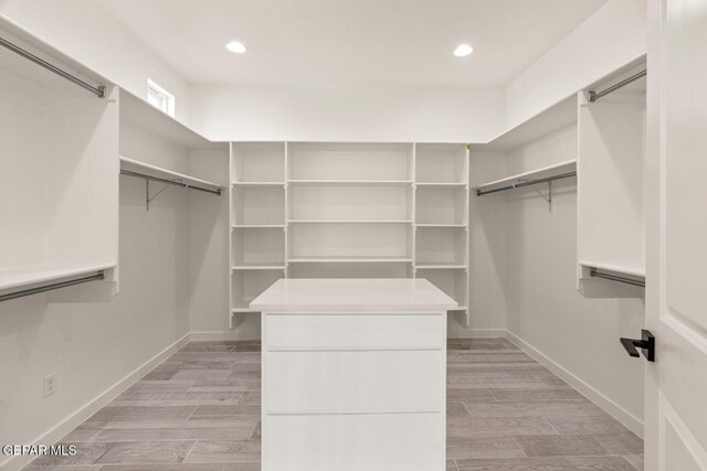 13397 Highworth Dr, El Paso, TX 79928 - spacious closet with light wood-style flooring